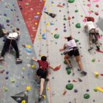 youth on climbing wall